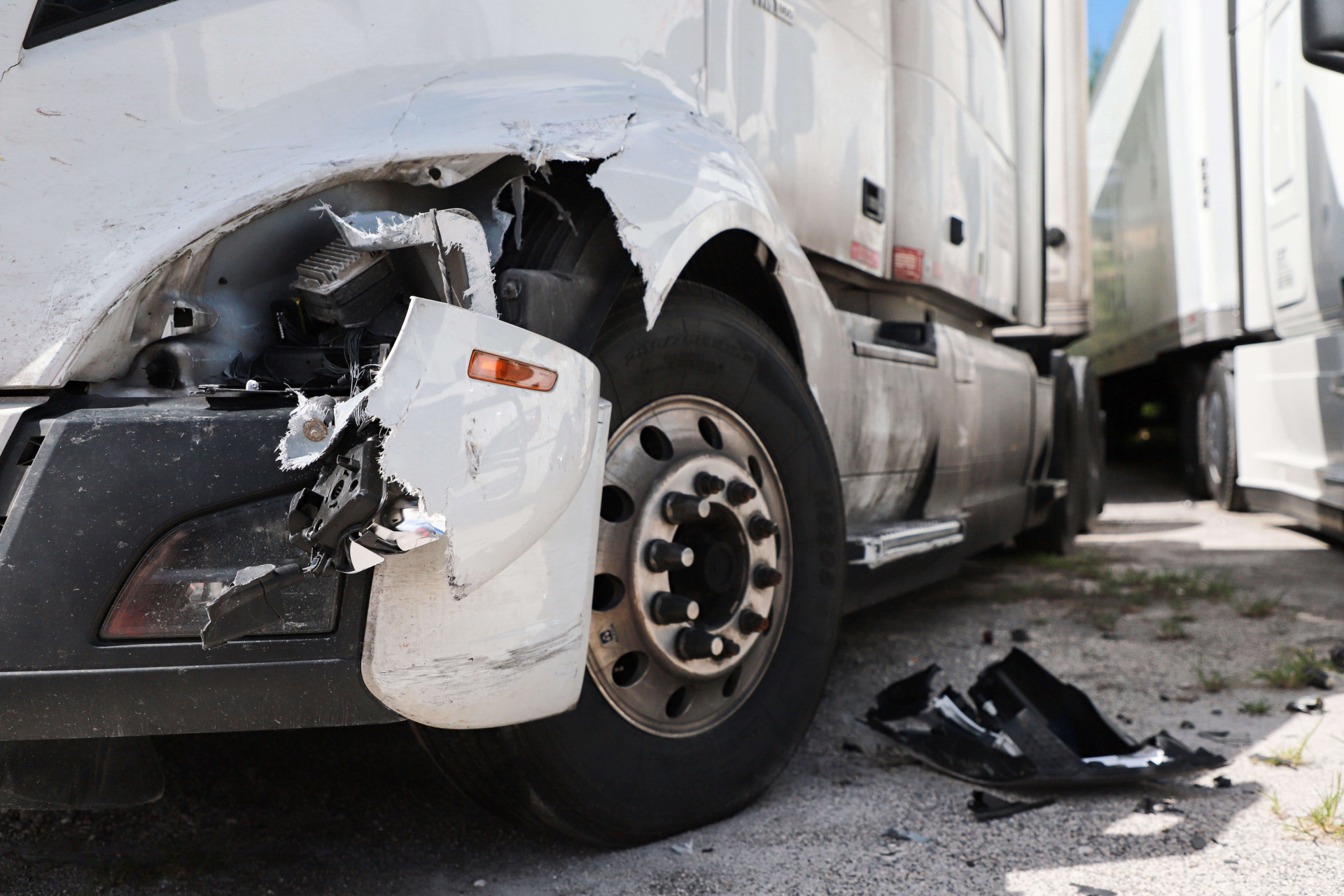 Semi-truck cab damaged in a crash