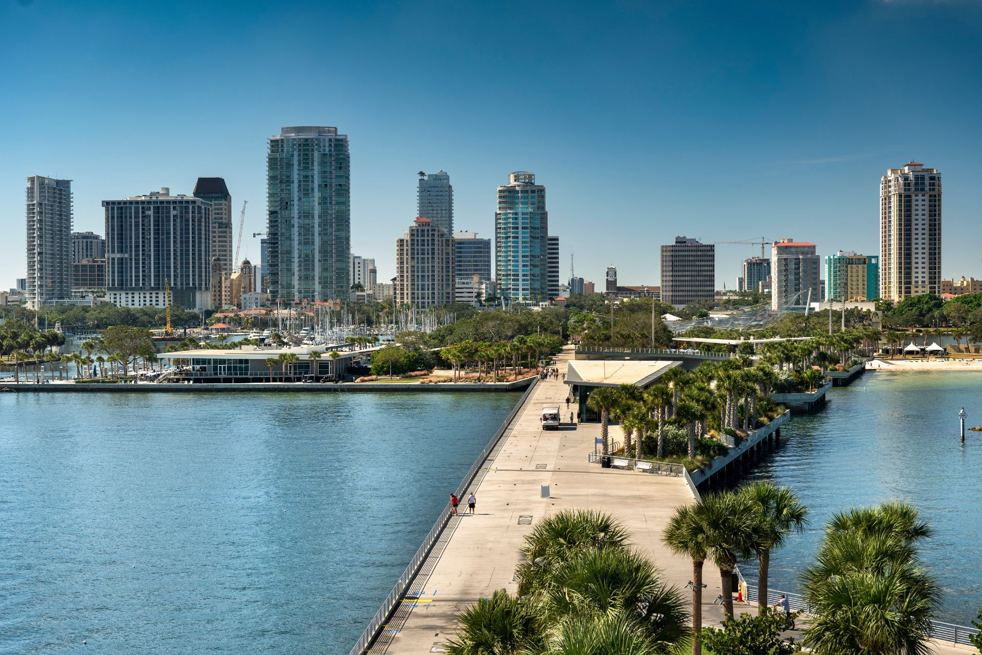 Waterfront city skyline with a pier