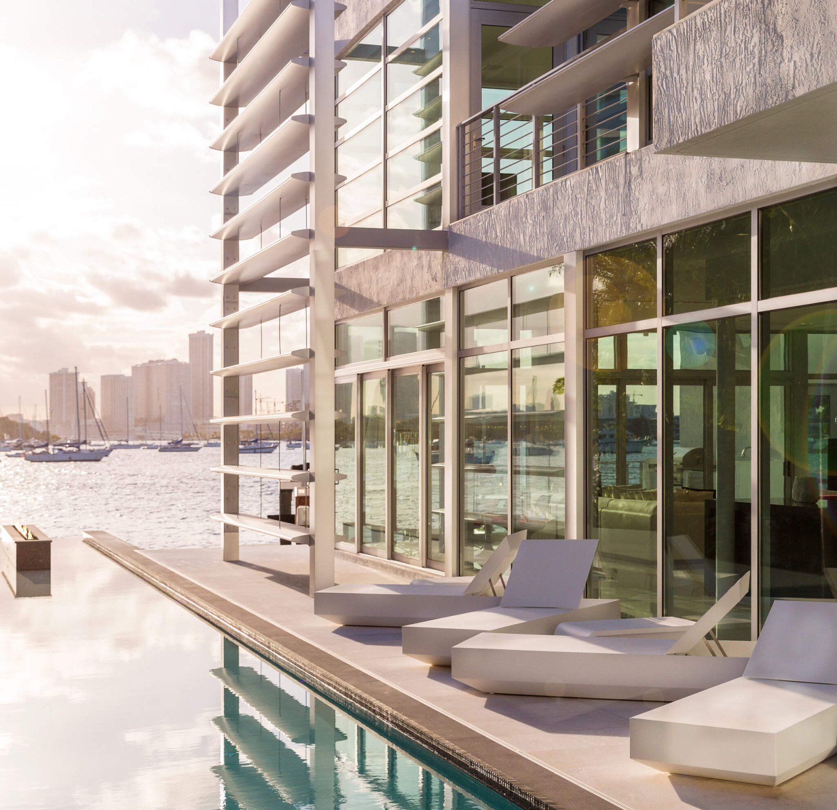 Modern condominium building with a pool deck