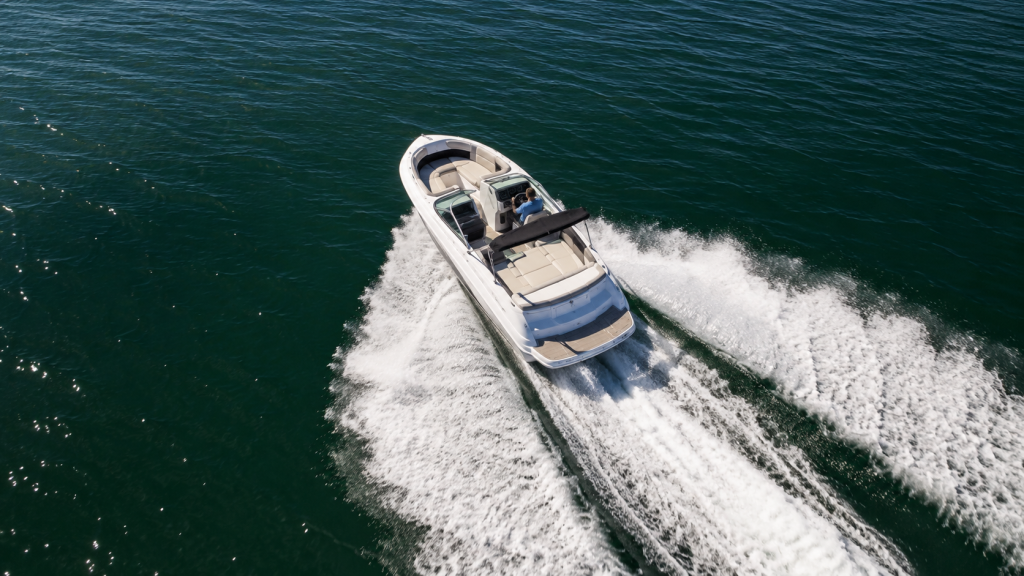 Speedboat cutting across open water